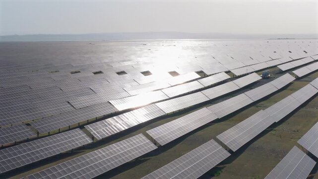Aerial drone view of large solar panel power station in northwest China, renewable energy base on desert land，new energy, solar energy
