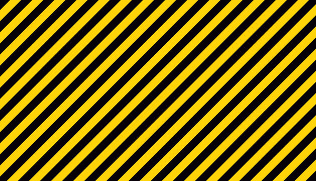 Seamless diagonal black and yellow hazard stripes pattern background, perfect for safety and construction themes.