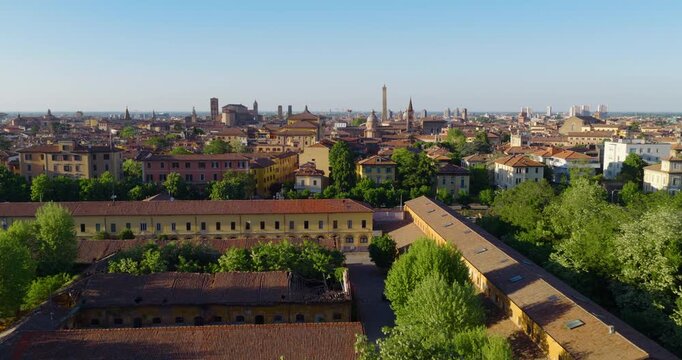 Panoramic View Of Historic City Skyline Of Bologna, Italy, With Terracotta-colored Roofs And Medieval Towers. - aerial shot