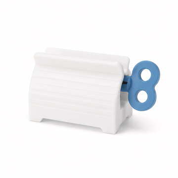 White Plastic Toothpaste Squeezer Isolated on White Background