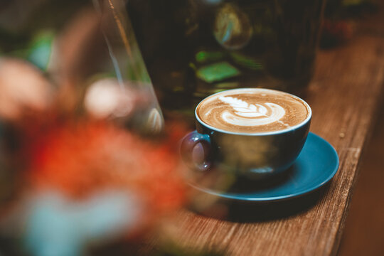 Coffee cup on table in cafe