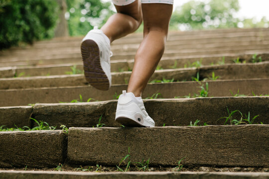 Female jogger on steps