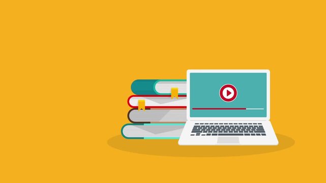 Laptop displaying a video play icon rests beside a stack of colorful books.