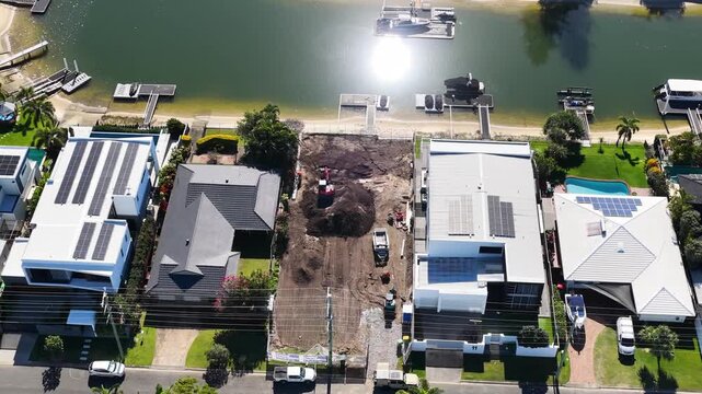 Aerial View of Luxury Waterfront Real Estate and Construction Site