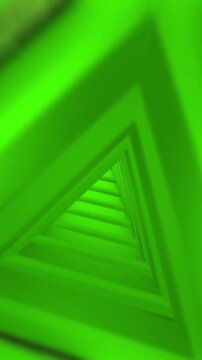 Abstract green triangular tunnel vortex motion background animation