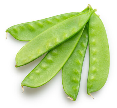 A loose pile of fresh, young green snow peas in pods, isolated on a white background.