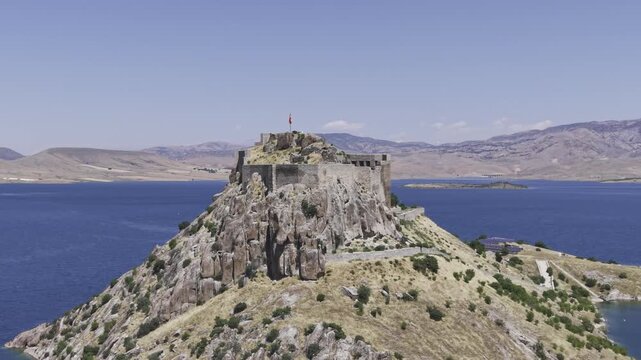 Aerial Drone View of Pertek Castle on Keban Reservoir in Tunceli, Turkey with Historic Fortress Landscape