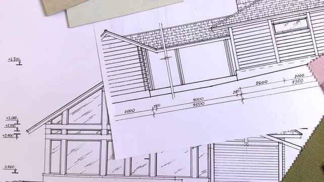 Architectural blueprint with fabric swatches, wood sample and ruler, interior design moodboard, material selection, renovation planning and residential design concept.