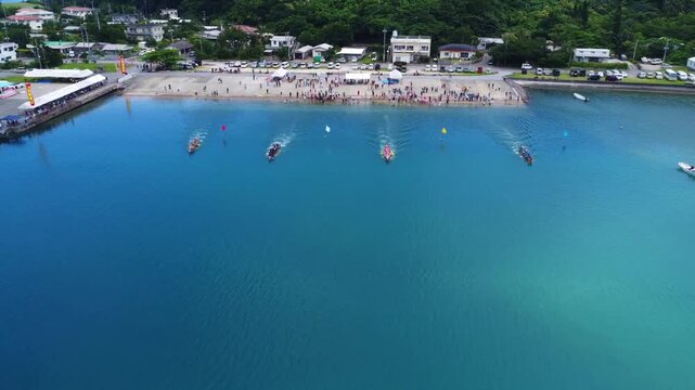 Aerial Drone View of Traditional Boat Race Start Moment in Okinawa, Japan