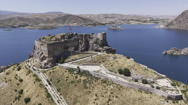 Aerial Drone View of Pertek Castle on Keban Reservoir in Tunceli, Turkey with Historic Fortress Landscape