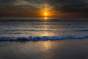 beautiful golden sunset over the Atlantic Ocean © wundermann