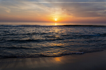 beautiful golden sunset over the Atlantic Ocean © wundermann