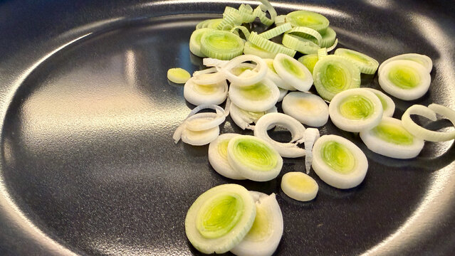Overhead View of Chopped Leek in Cooking Pan