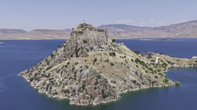 Aerial Drone View of Pertek Castle on Keban Reservoir in Tunceli, Turkey with Historic Fortress Landscape