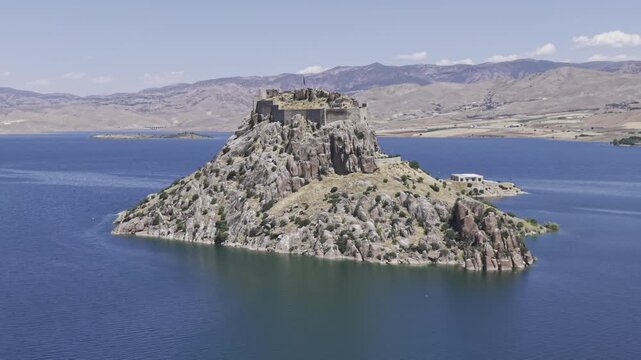 Aerial Drone View of Pertek Castle on Keban Reservoir in Tunceli, Turkey with Historic Fortress Landscape