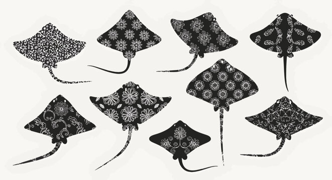 Collection of nine stingray silhouettes with intricate white floral and geometric patterns on a white background, featuring various species like manta rays and eagle rays for design.