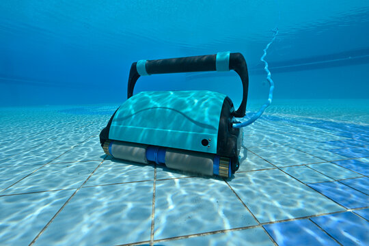 Submersible robot with cable for cleaning the walls and floor of the pool 