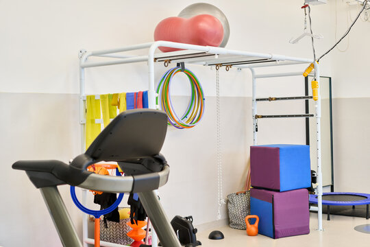 Physical therapy equipment in a rehabilitation center gym setting