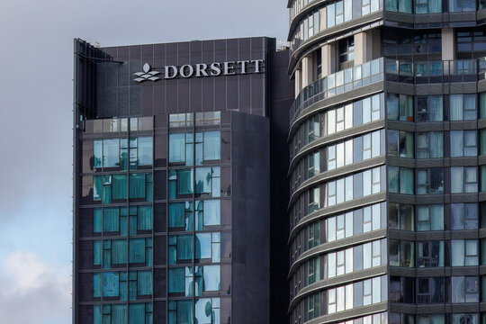 Dorsett logo displayed on top of the hotel building in Canary Wharf, London, United Kingdom.