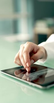 Examining hand X-ray image on digital tablet