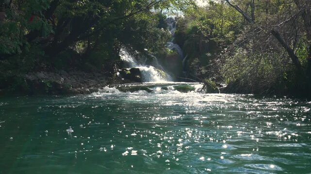Wonderful Slow Motion Waterfall in Plitvice Lakes National Park with beautiful waterfalls and lush green surroundings