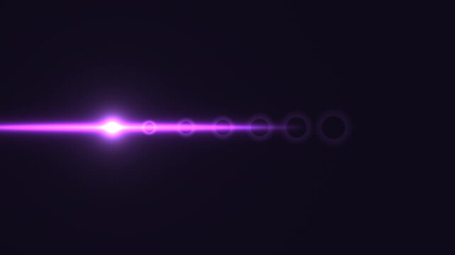 Light beam moves through dark space with glowing effect