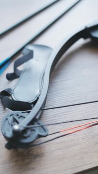 Close-up of compound bow and arrow