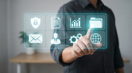 Obraz premium Person using holographic interface with business icons for digital workflow management and modern software administration in professional office environment with blurred background