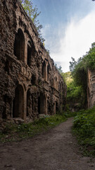 Fototapeta premium old abandoned brick fortification. arched windows, destruction, cultural heritage