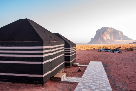 Striped Bedouin tents and mountain view in Wadi Rum, Jordan