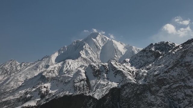 Majestic Rakaposhi Mountain Peak, Hunza Valley, Gilgit Baltistan, Pakistan, Snow-Capped Himalayas, Scenic Nature Landscape, Cinematic 4K Footage