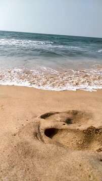 Sunny Tropical Beach with Footprint in Golden Sand and Crashing Ocean Waves - Full HD