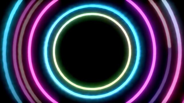 Abstract neon circles in vibrant colors against a black background.