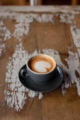 Obraz premium Minimalist café interior with a cup of coffee