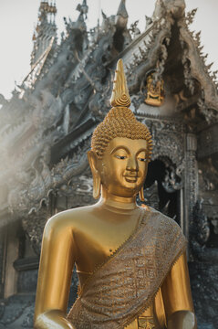 Golden Buddha statue at Wat Sri Suphan Silver Temple in Chiang Mai