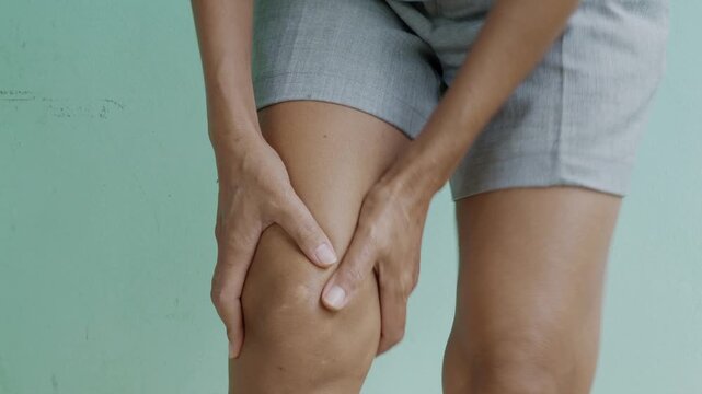 Woman massage knee pain foot woman, sprain feet heel knee sore people chronic joint leg hurt injury bone arthritis skeleton girl accident fitness sport exercise medical care