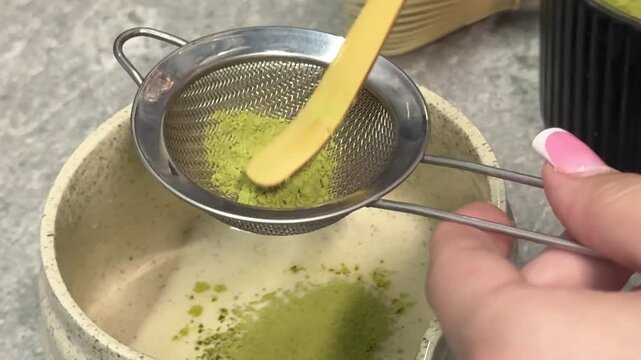 poor quality matcha is swamp green Iced matcha latte preparation in clear plastic cup showing pale green color uneven texture and diluted tea drink served with ice and black straw