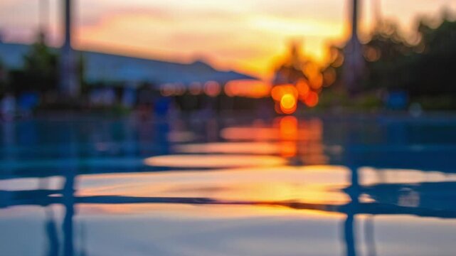 Cinematic parallax shot layering sharp water ripples foreground with shimmering reflection midground