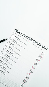 Daily health checklist with pen and icons for wellness and self-care