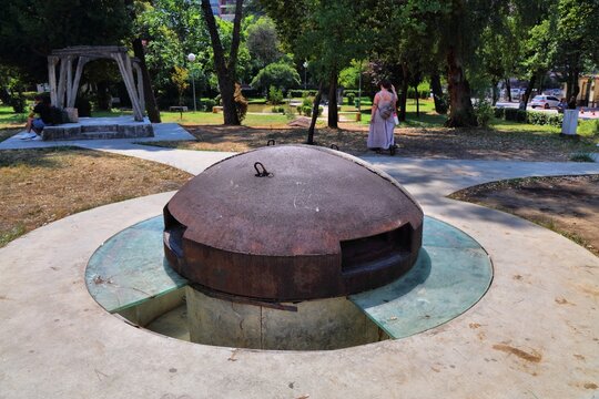 Old concrete and metal bunker in Tirana, Albania. Historic military infrastructure in Lulishte Ismail Qemali public park.
