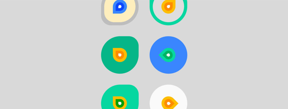 Colorful circles with smaller inner circles. Simple design, gray background. Geometric shapes present, clean aesthetic.