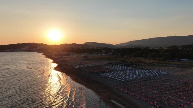 Ulcinj, Montenegro - Jun 29 2026: Aerial video of beaches and the sea during sunset golden hour