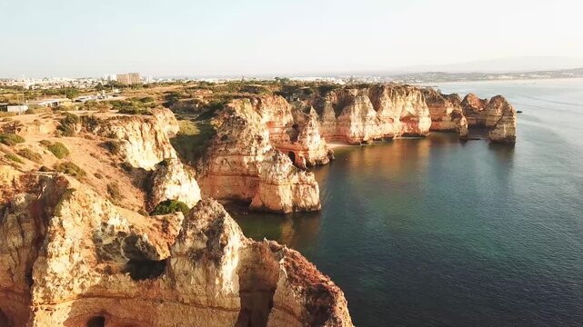 Aerial view of the scenic limestone cliffs and Atlantic Ocean at Ponta da Piedade Portugal.