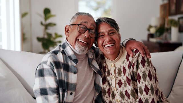 Laughing, face and senior couple in lounge, embrace and bonding with partner on weekend or affection. Portrait, elderly man and connection with mature woman, happiness and hug with spouse in house