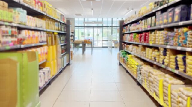 Moving Along the Shelves in a Grocery Store.