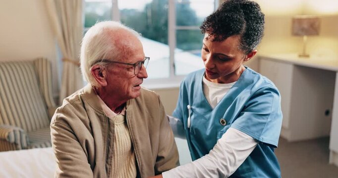 Talking, nurse and shoulder pain of senior man in home for healthcare, elderly support or wellness. Retirement, caregiver and old person with patient care, homecare and stiff joint with arthritis