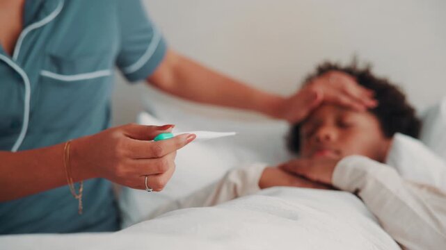 Sick child, home and hands with thermometer in bedroom, forehead check and monitor body temperature. Black kid, support and person with heat indicator for fever assessment, help or childcare in house