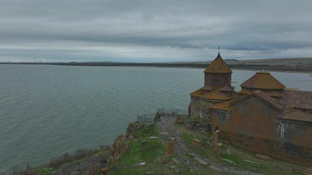 Aerial view of Hayravank monastery with Lake Sevan in the background, Armenia