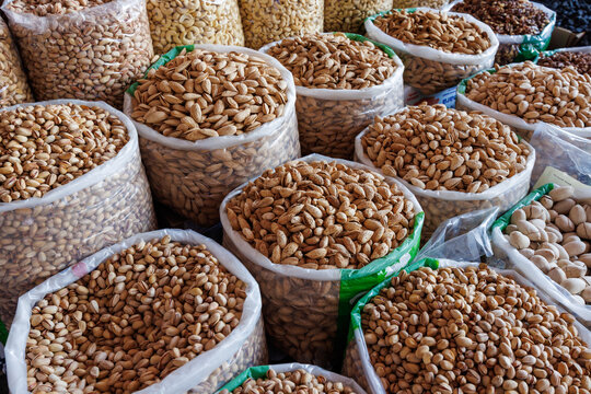 Samarkand, Uzbekistan - June 6, 2026: Nuts and dried fruits at Siab Bazaar