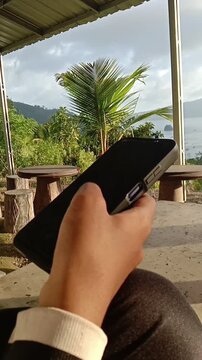 video Woman Hand Scrolling Smartphone Screen with Mobile App and Social Media Concept